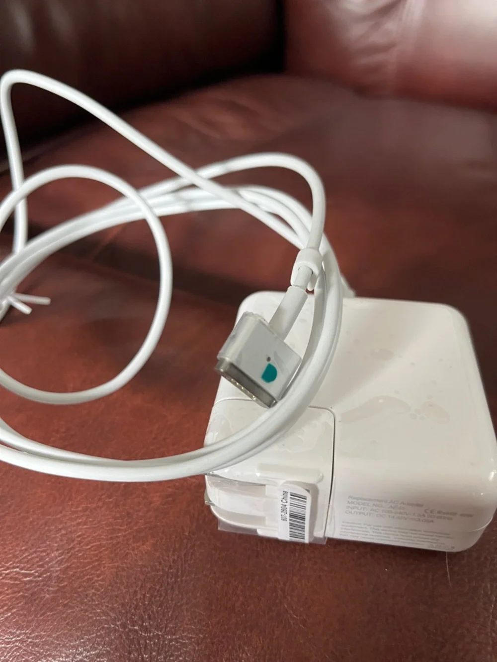 White Laptop Power Adapter with Attached Charging Cable